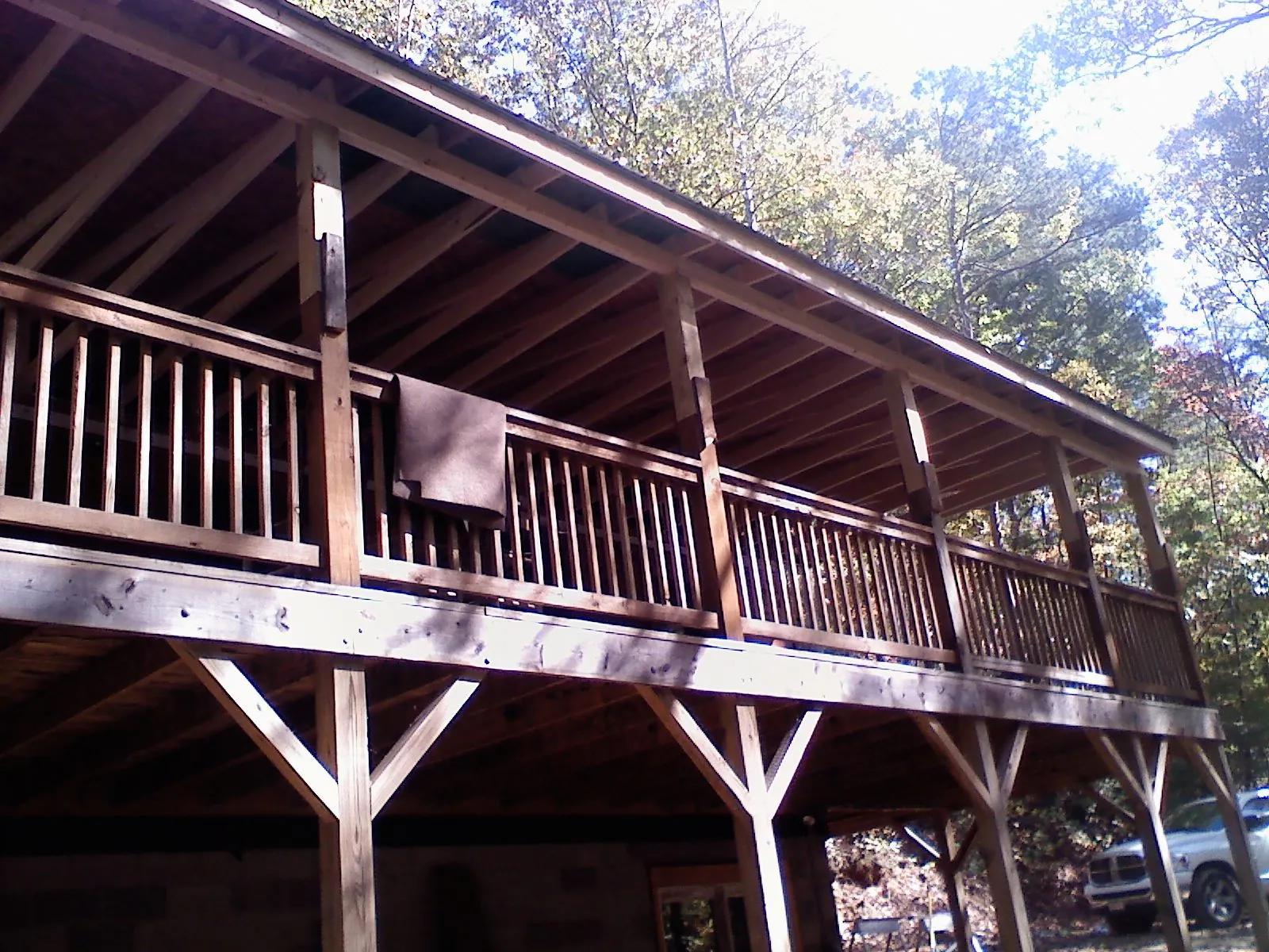 Timber framing under a new elevated porch and deck — Roof Leak Repair in Valley by Roofing Brothers